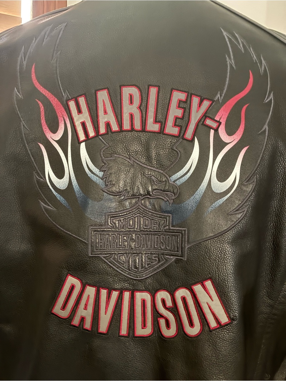 Harley-Davidson Black Leather Jacket with Red and White Flame Logo